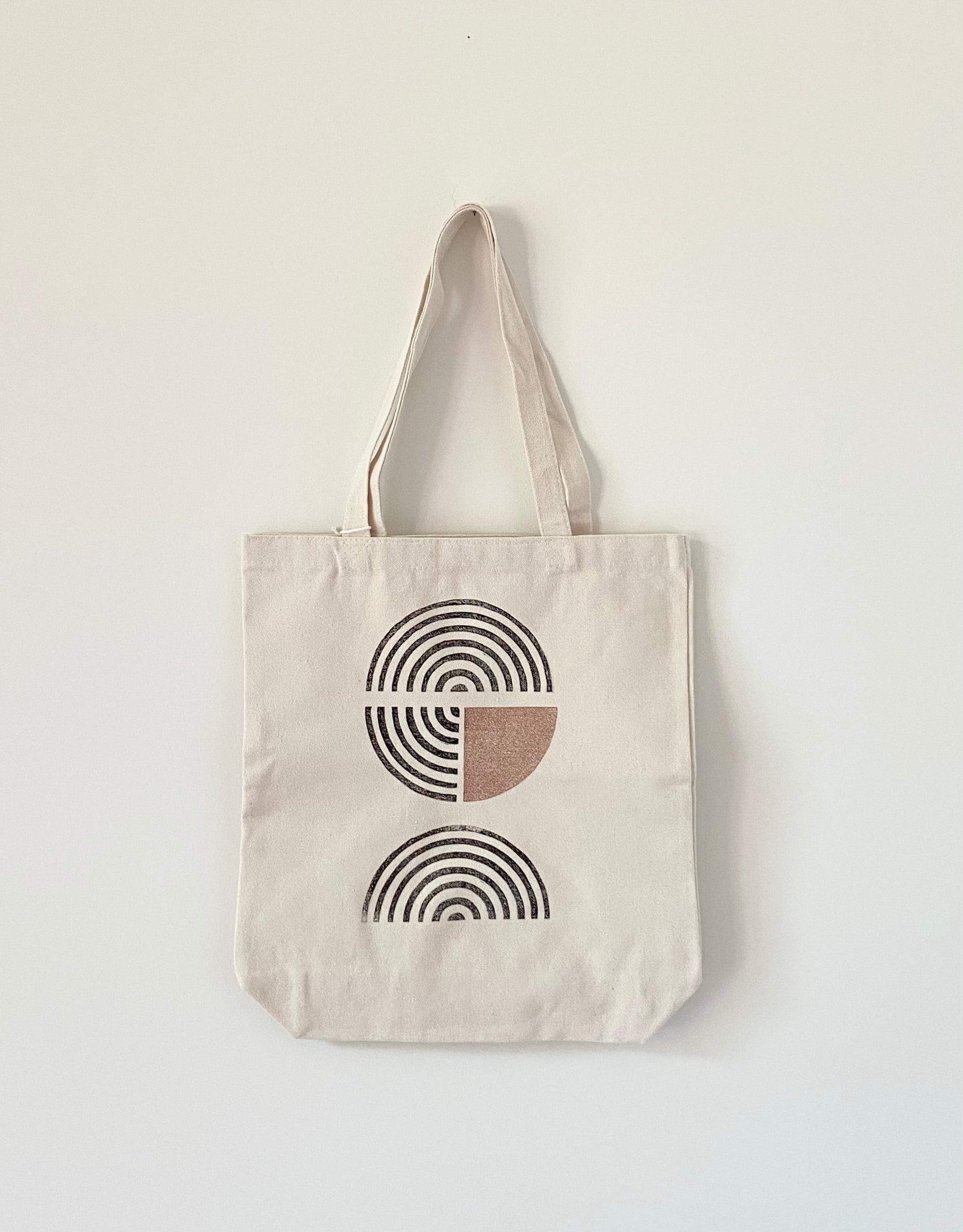 Block printed cotton canvas tote bag with neutral, modern print.