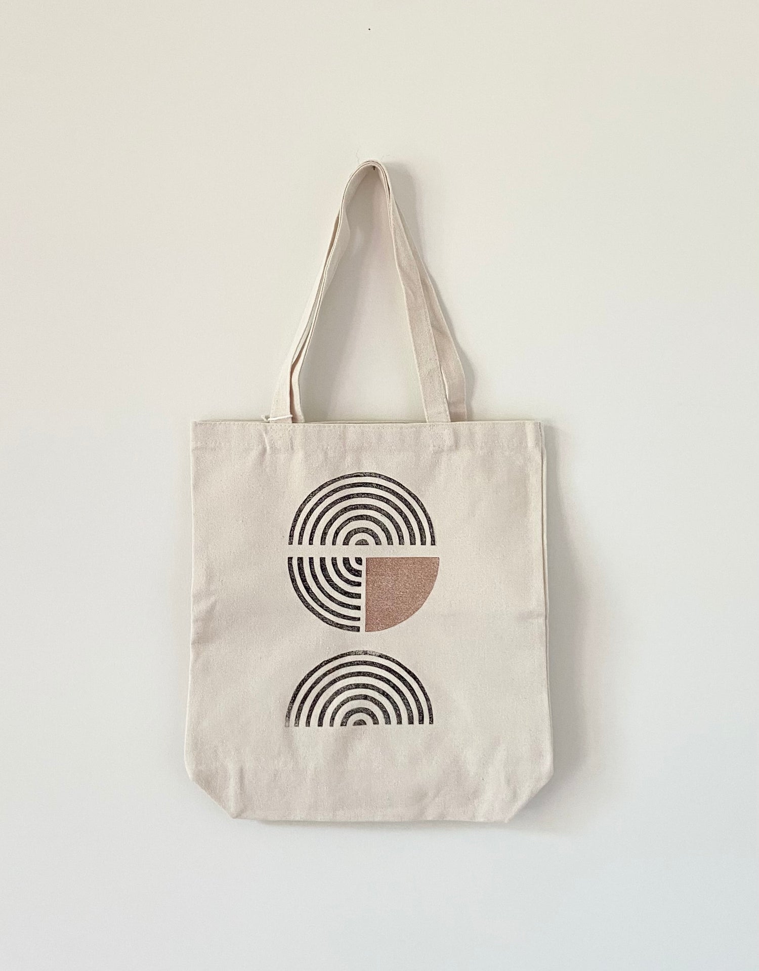 Block printed cotton canvas tote bag with neutral, modern print.